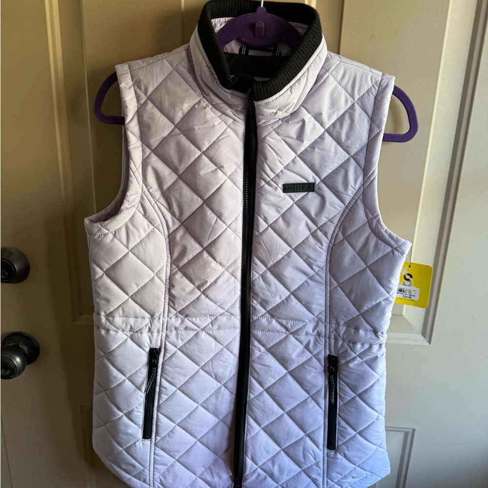 Quilted White Vest with Black Trim